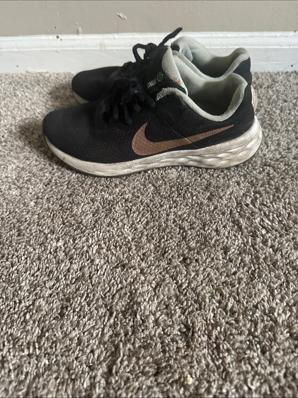 Nike Black Sneakers with Copper Swoosh